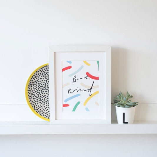 'Be Kind' colourful print on sale